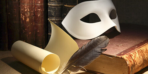 Dramaturgy concept. Vintage still life with quill and scroll near mask and old books on dark background